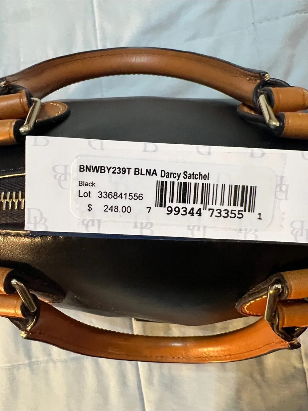 Dooney & Bourke Beige Canvas Messenger Bag with Tan Leather Trim